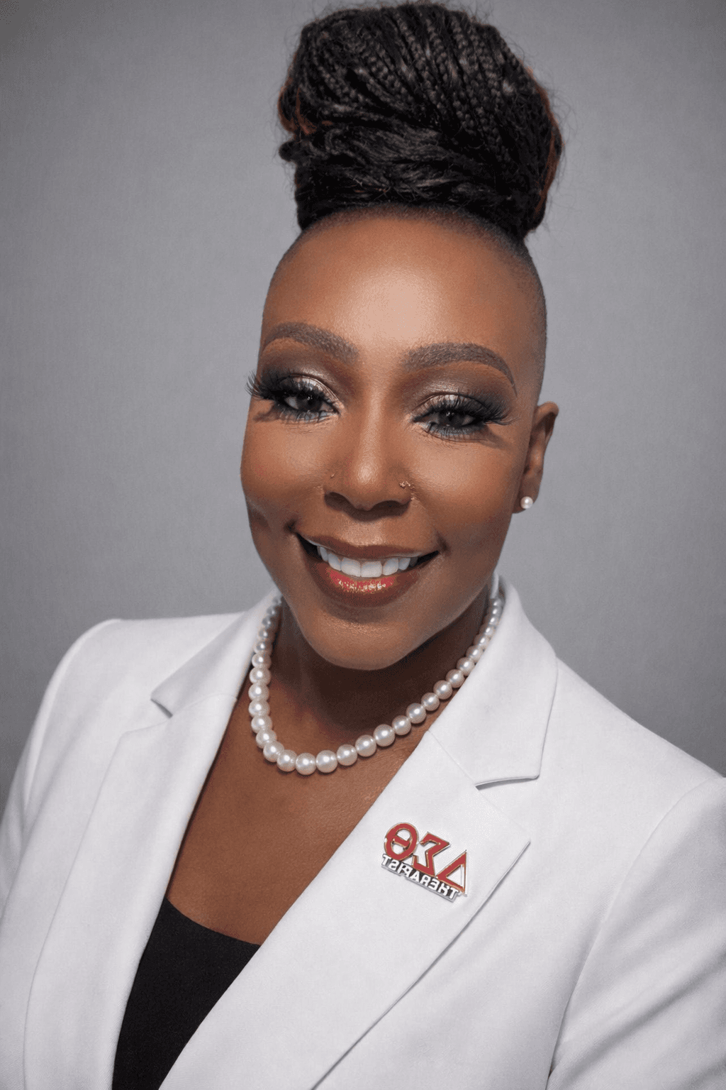 Professional portrait of Brandelyn Williams in a conference setting